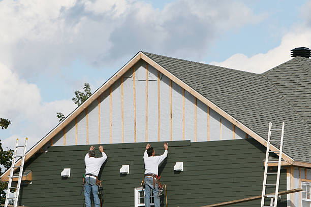 Professional Siding Installation technician working in Clarksville, VA